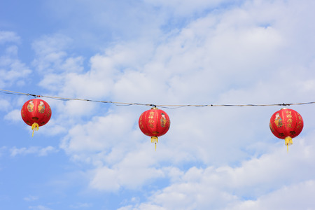 image of chinese new year lanterns hang on ropeの写真素材
