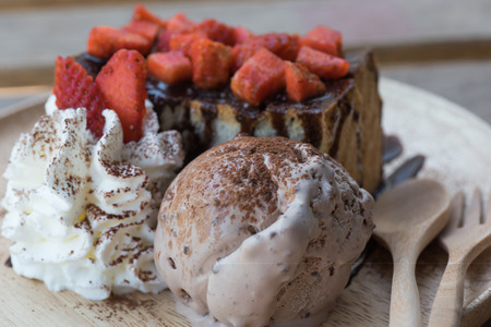 dish of delicious dessert with strawberry cakeの写真素材