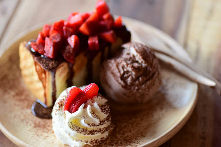 dish of delicious dessert with strawberry cakeの写真素材