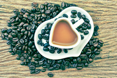 white heart shape of coffee cup in vintage styleの写真素材