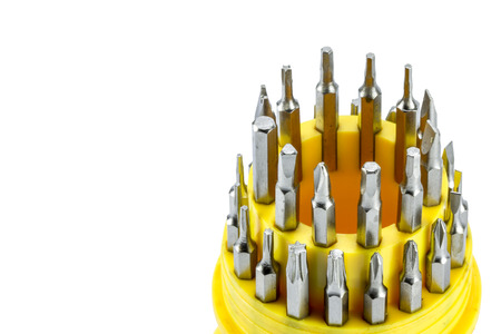 Set of steel screwdrivers with tools on a white backgroundの写真素材