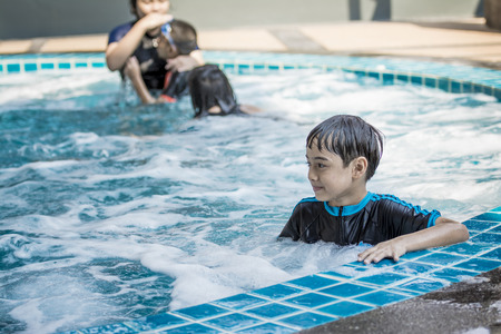 The Asian boy swimming on the weekendの写真素材
