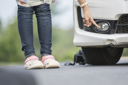 Traces of plying the front bumper on a white car.の写真素材