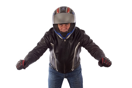 Biker with the helmet looking sharp in driving poseの写真素材
