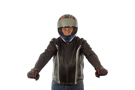Biker with the helmet looking sharp in driving poseの写真素材