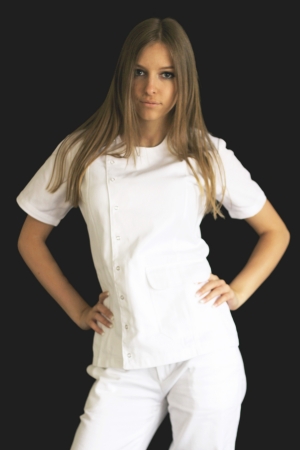 Pretty young female doctor posing in uniformの写真素材