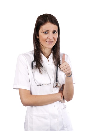 Pretty young female doctor posing in uniformの写真素材