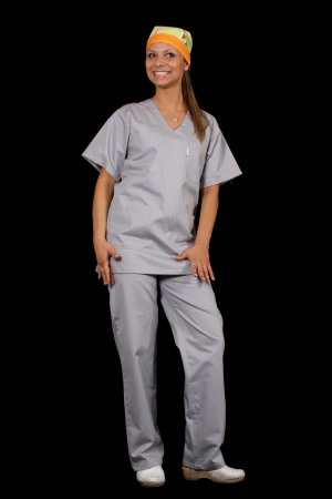 Pretty female surgeon posing and smilingの写真素材