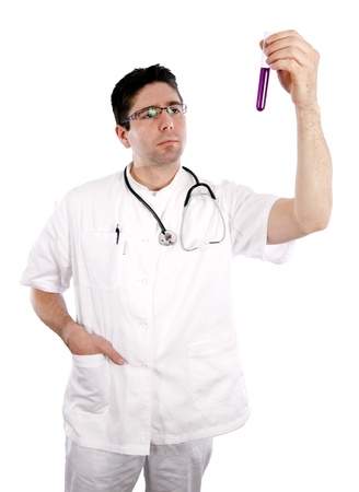 Doctor smiling and holding a test tubeの写真素材