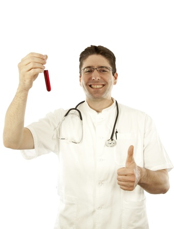 Doctor smiling and holding a test tubeの写真素材