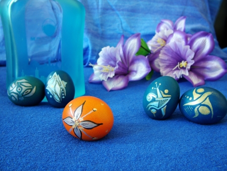 Beautiful painted easter eggs on a colorful backgroundの写真素材