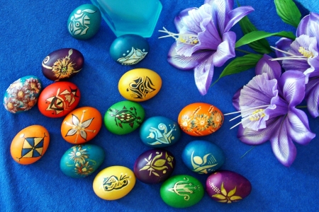 Beautiful painted easter eggs on a colorful backgroundの写真素材