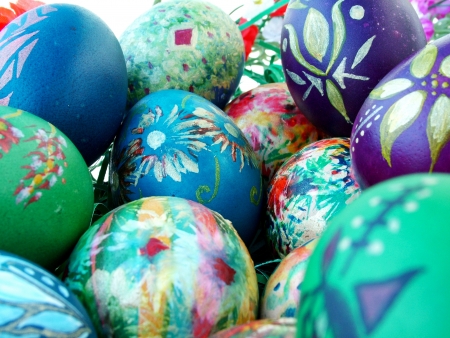 Beautiful painted easter eggs on a colorful backgroundの写真素材