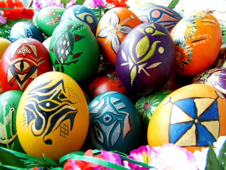 Beautiful painted easter eggs on a colorful backgroundの写真素材