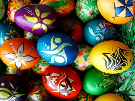 Beautiful painted easter eggs on a colorful backgroundの写真素材