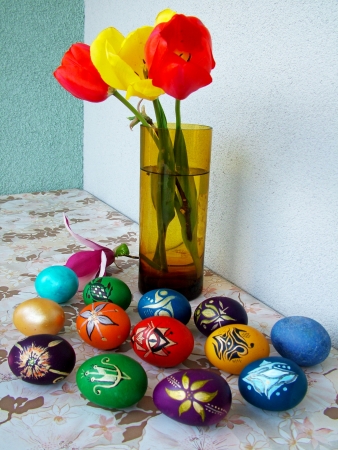 Beautiful painted easter eggs on a colorful backgroundの写真素材
