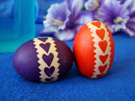 Beautiful painted easter eggs on a colorful backgroundの写真素材