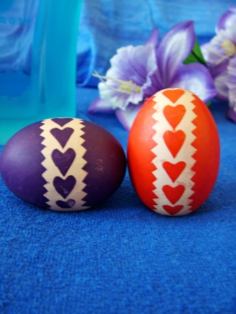 Beautiful painted easter eggs on a colorful backgroundの写真素材