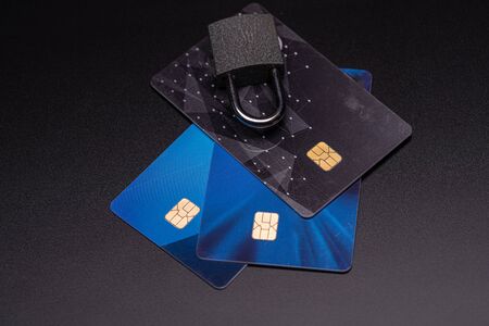 Close up of a credit or debit card for security background. Safety payments. Secure payments, money...
