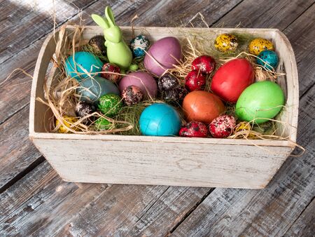 Easter Painted Eggs on wooden backgroundの写真素材