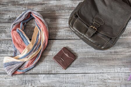 Vintage still life of random objects of modern woman on wooden board