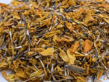 Texture background of dried flowers calendula .Homeopathy Concept