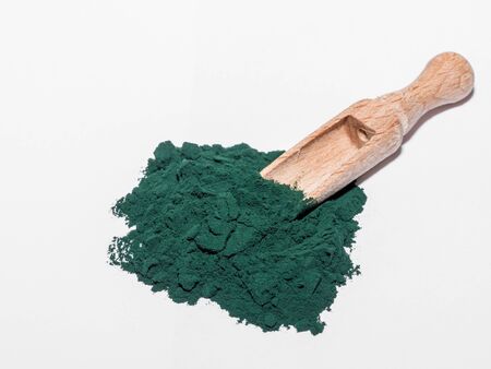 Spirulina Algae Powder, close upon white background .Macro, selective focusの写真素材
