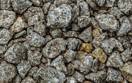 Background texture of stone wall. Natural stone, a wall of natural stone.