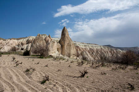 Goreme, Turkey - April 23, 2019: Rural Cappadocia landscape. Stone houses of Cappadocia.のeditorial素材