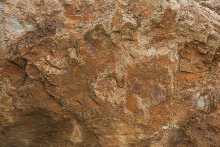 Background texture of stone wall. Natural stone, a wall of natural stone.