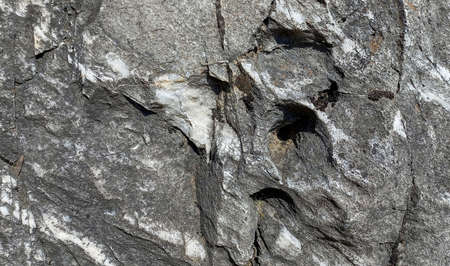 Background texture of stone wall. Natural stone, a wall of natural stoneの写真素材