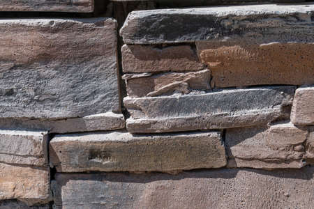 Background texture of stone wall. Natural stone, a wall of natural stoneの写真素材