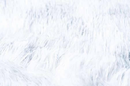 Close up white shaggy artificial fur texture or carpet for background.の写真素材