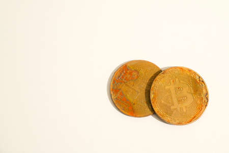 Close up old golden coin with bitcoin symbol isolated on white background with clipping path , crypto currency business. bitcoin coin finance conceptの写真素材