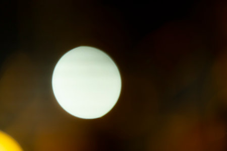 abstract background with bokeh defocused lights and shadow.の写真素材