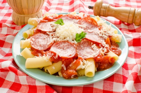 Rigatoni pasta with tomato sauce and pepperoniの写真素材