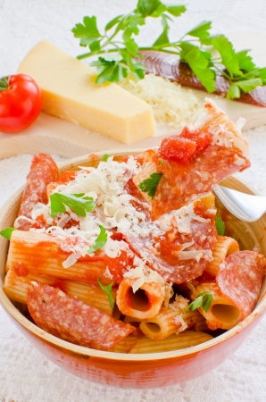 Rigatoni pasta with tomato sauce and pepperoniの写真素材