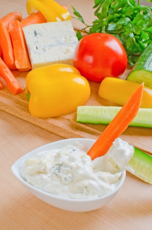 Blue cheese dip with raw vegetablesの写真素材