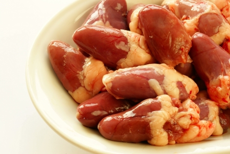 Raw chicken hearts             の写真素材