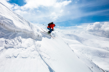 good skiing in the snowy mountains, Carpathians, Ukraine, good winter day, incredible ski jump, ski seasonの写真素材