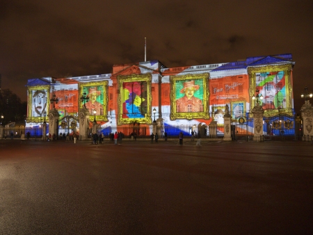 LONDON - APRIL  21 - Buckingham Palace projection shows the portrait of Queen Elizabeth and self-portraits of young people in the art project Face Britain on April 21, 2012 in Londonのeditorial素材