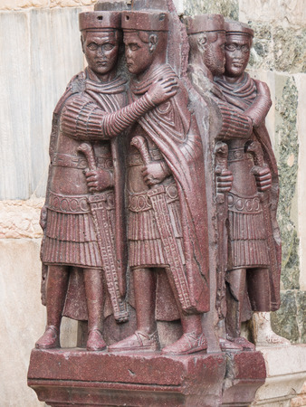 The four Tetrarchs statue at the entrance of the Doge's Palace in Veniceの写真素材