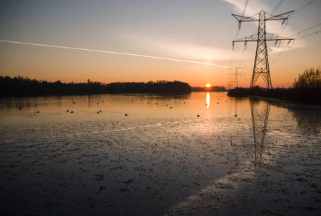 Power pylons in landscapeの写真素材