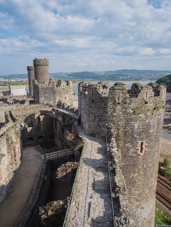 CONWY, WALES - 28 SEPTEMBER 2013: View on the battlements of massive Conwy Castle in Wales built by king Edward I as one of the fortifications during the conquest of Wales in the 13th Centuryのeditorial素材