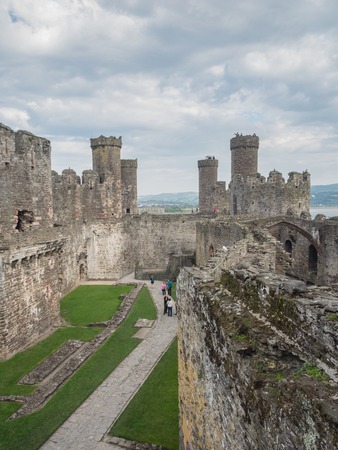 CONWY, WALES - 28 SEPTEMBER 2013: View on the battlements of massive Conwy Castle in Wales built by king Edward I as one of the fortifications during the conquest of Wales in the 13th Centuryのeditorial素材