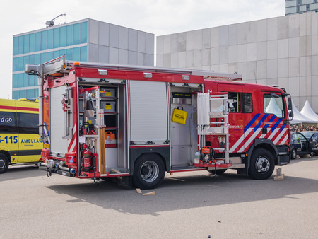 ALMERE, NETHERLANDS - 12 APRIL 2014: Fire engine at scene of an eneacted emergency during the first...