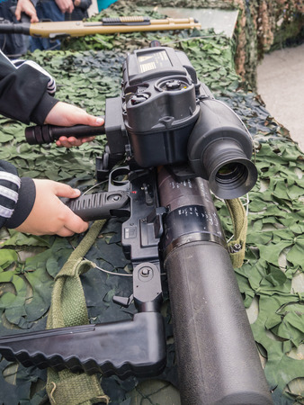 ALMERE, NETHERLANDS - 12 APRIL 2014: Machine gun as used by the Dutch military on display and...