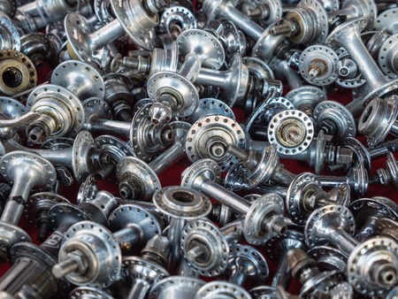 GAIOLE IN CHIANTI, ITALY - 4 OCT. 2014: Vintage bike parts on display in a market stall at L\'Eroica, a touristic and historic cycling event for owners of vintage bicycles who ride a tour through the province of Tuscany, mainly on gravel roads.のeditorial素材
