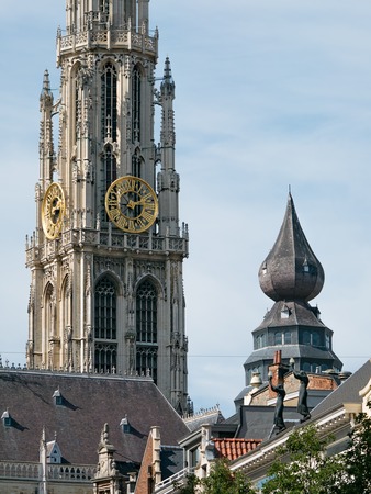 View on detail of the cathedral of Antwerp and other landmark buildings surrounding the Great Square or Grote Markt in Antwerp, Belgiumの写真素材