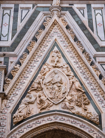 Carving of Madonna of the Girdle at portal of Florence cathedralの写真素材